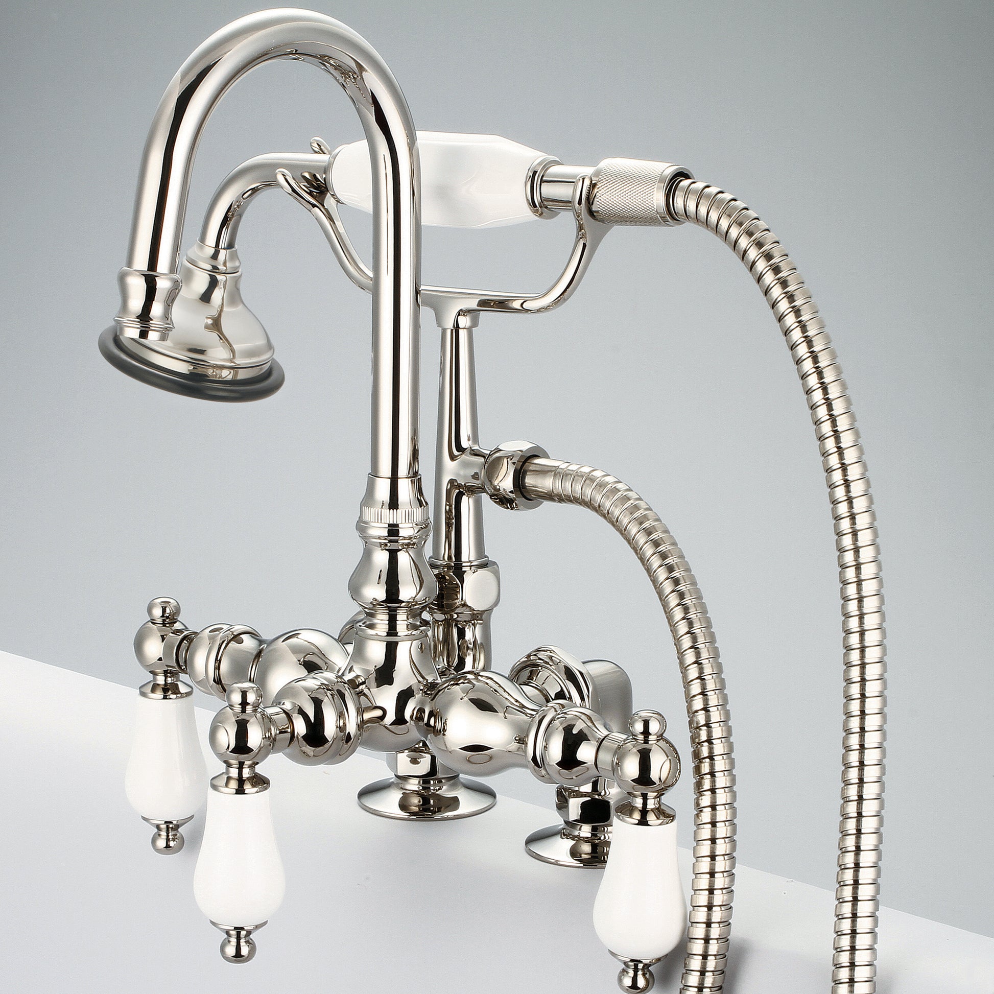 Vintage Classic 3.375" Center Deck Mount Tub Faucet With Gooseneck Spout, 2" Risers & Handheld Shower in Polished Nickel Finish, With Porcelain Lever Handles Without labels